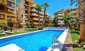 Turquesa Apartment,Punta Prima ,2 bed, 4 swimming pools and cabriolet Peugeot 307 included